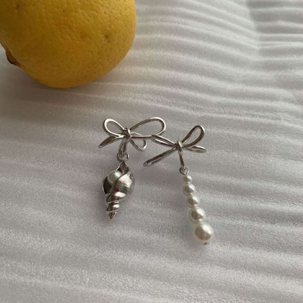 

net red personalized niche design style versatile conch shape asymmetric pearl bow earrings, Black