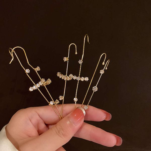 

trendy design puncture zircon earrings encircling outline word lightning net red earrings