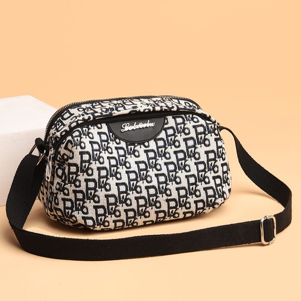 

luxury designer summer new leisure fashion women's bag single shoulder messenger nylon cloth middle-aged mother's