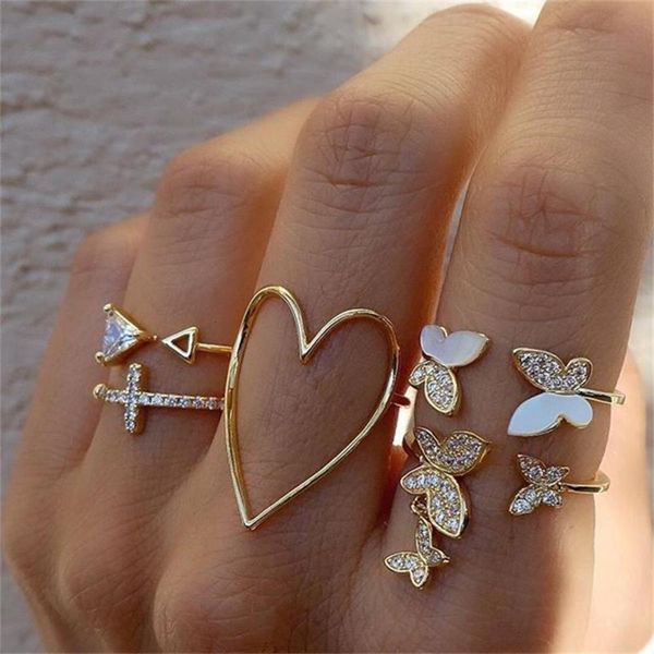 

cross triangle love hollowed out full diamond oil dripping butterfly 5 piece set joint ring, Black
