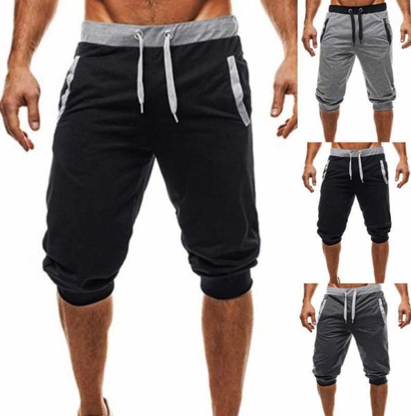 

quick dry running shorts men solid sports clothing fitness bodybuilding short pants sport homme gym training beach men's, White;black