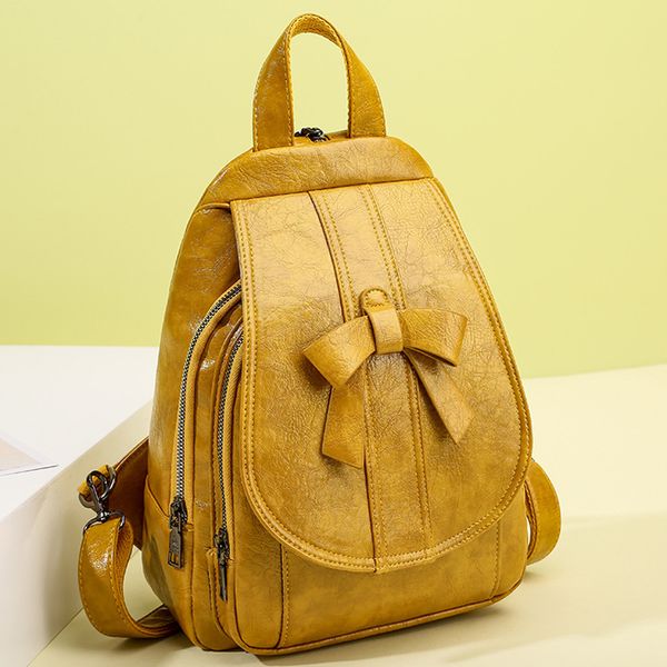 

Wholesale ladies leathers shoulder bag sweet little fresh solid color leather backpack simple joker yellow embossed handbag street trend bow tassel backpacks, Yellow2 9213 style one