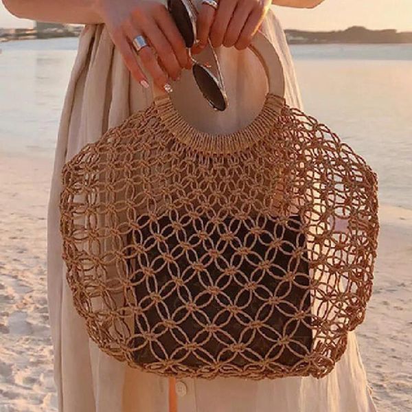 Borse a tracolla Totes Totes Borse a tracolla Borsa di paglia intrecciata cava Moda Mesh Borsa da donna Estate Manico in legno Spiaggia per il 2023 Marche Borsa da viaggio Bali Frizione