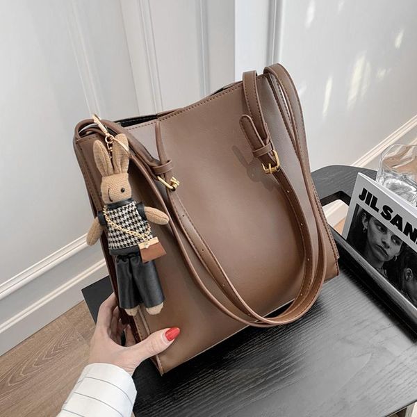 

vintage large capacity bucket shoulder bags for women doll pendant design pu leather office work ladies tote winter 2021 cross body