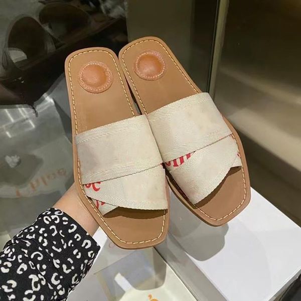 Odunsu Düz Katır Sandal Tasarımcı Ayakkabı Kadın Tuval Baskı Işlemeli Slaytlar Flats Terlik Siyah Beyaz Deri Çevirme Kutusu Boyutu 35-41