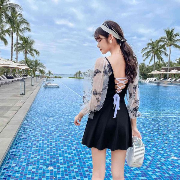 

2021 new long sleeve embroidered swimsuit women's one-piece skirt style gathered with chest cushion backless solid color swimsuit, White;black