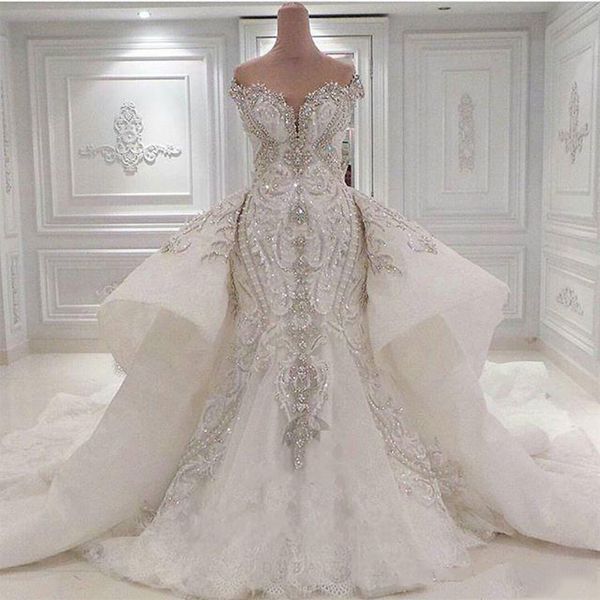 Abito da sposa di lusso a sirena con perline 2021 con gonna oversize staccabile Dubai arabo con spalle scoperte in pizzo cristalli scintillanti diamanti abiti da sposa