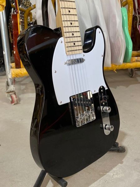 

electric guitar black color chrome hardware maple fingerboard