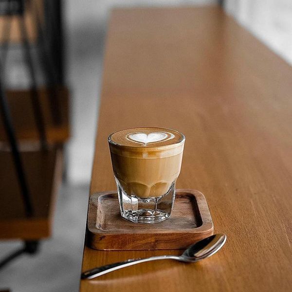 

wine glasses blue bottle, flat white coffee cup, glass water fine same style