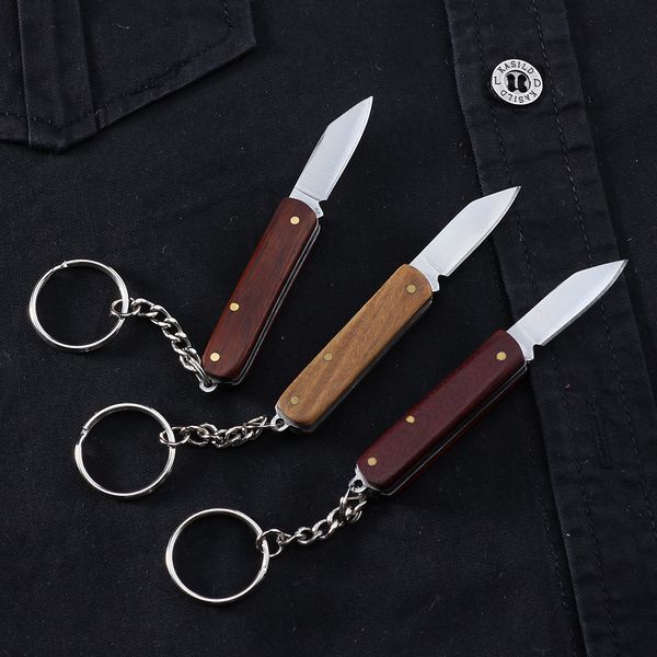 Mini coltello classico con manico in legno di sandalo Portachiavi portatile da esterno Coltelli pieghevoli Portatili da campeggio Zaino tascabile per autodifesa Strumento EDC