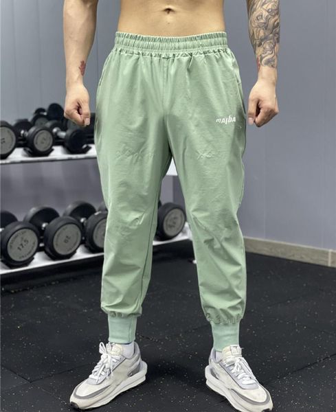

men joggers trackpants slim fit pants bodybuilding trousers jogging quick-drying sweatpants running gyms, Black;blue