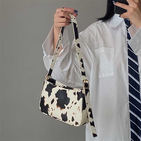 

fashion design milk cow print women underarm baguette handbags vintage pu leather girls shoulder messenger bags women armpit bag 211025