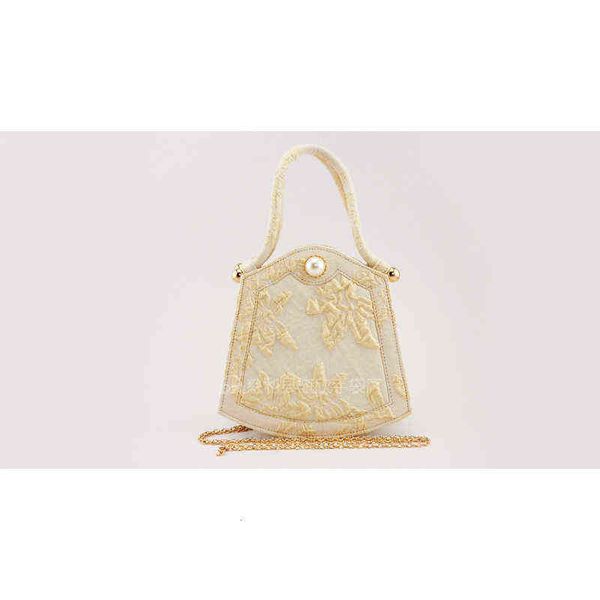

minority gold wire embossed lily metal bead handbag qx20059