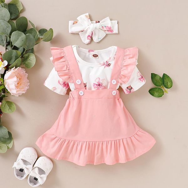 Roupa de meninas de verão terno Europeu e americano de manga curta flor impressão top + saia sólida suspensora com faixa de cabelo 3pcs 210515