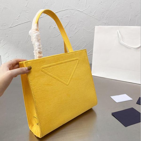 

large capacity totes canvas shoulder bags wide shoulder straps designers fashion handbags classic letter triangular