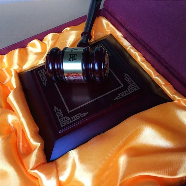 

auction hammer law court judge trial wooden hand tools