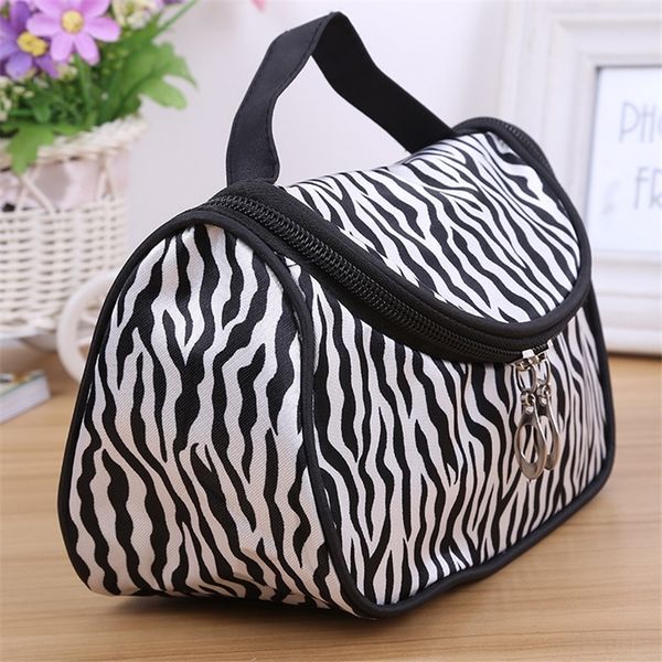 

ac5L multi function korean fashion zebra pattern yuanbao women's hmummy korean portable hand and cosmetic storage bags cosmetic bag