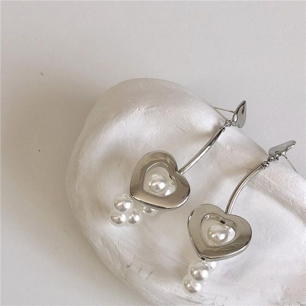 

dangle & chandelier aomu korea silver color metal imitated pearl heart earrings retro smooth reflective hollow long drop for women jewelry