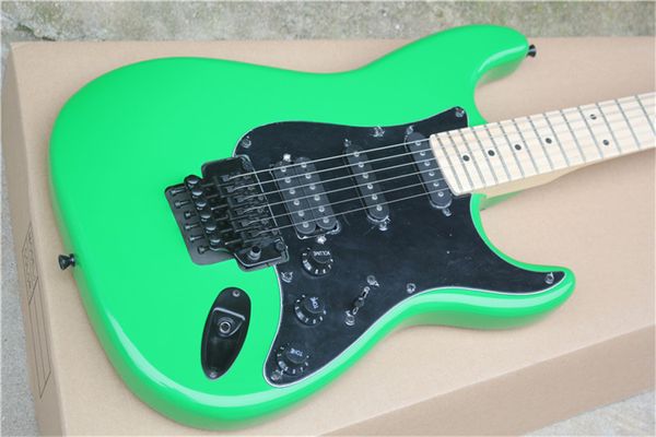 

6 strings green electric guitar with tremolo bar,rosewood fretboard