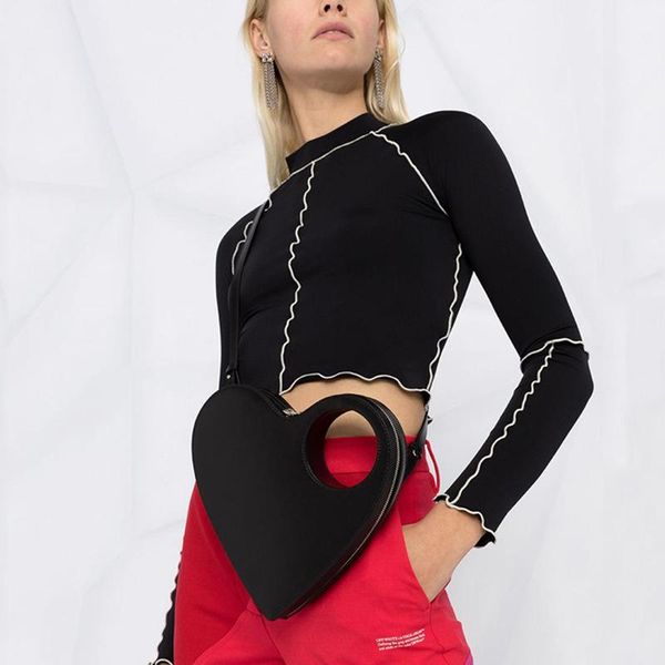 

evening bags 2021 spring niche fashion love heart-shaped single shoulder clutch pu bag for women product hollow handle crossbody handbags