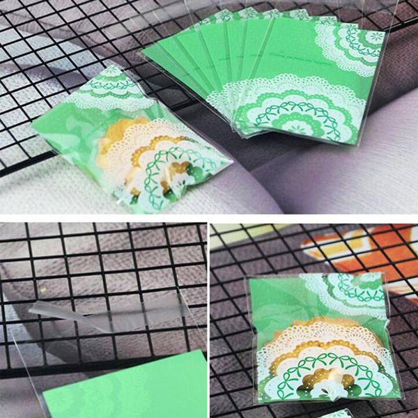 

100pcs/pack 7x10cm small fresh green lace bow self-adhesive transparent packaging bag biscuits festival gift wrap