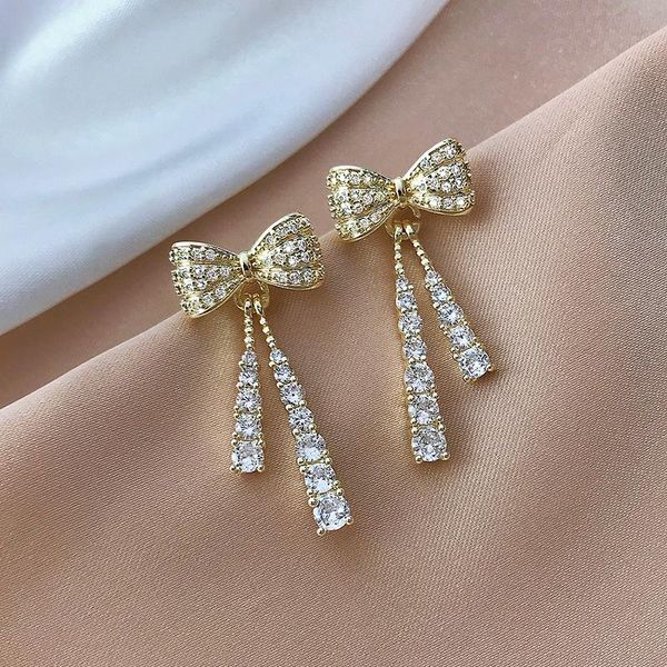 

south korea's trendy french bow micro-inlaid zircon tassel earrings sweet stud, Golden;silver
