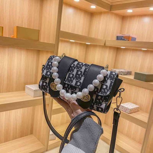 

design star pearl hand new fashion messenger versatile popular pillow bag handbags