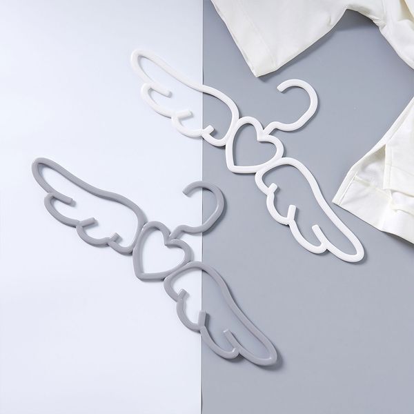 

5 pcs angel wing shape clothes hangers traceless non-slip shirt trouser coat hanger for home l wardrobe organizer