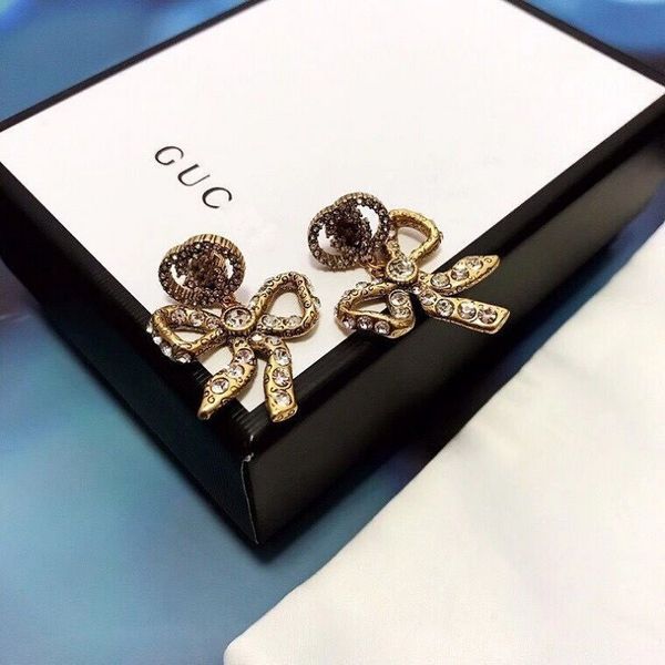 

aaa designer jewelry gujia 21 new butterfly band drill earrings high version brass material, Golden