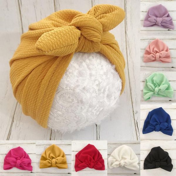 

solido elastico grande arco cappello del bambino di disegno sveglio tenere in caldo colore neonato fot caps & hats, Yellow