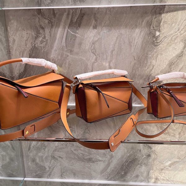 

2021 new female xiaoluo puzzle geometric hand leather shoulder zly