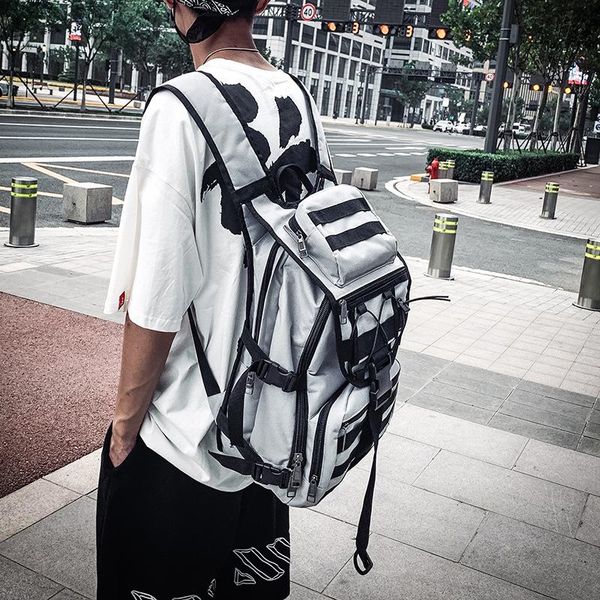 

backpack male brand tooling streets of europe and the united states men's backpacks fashion bulk bag female personality wild