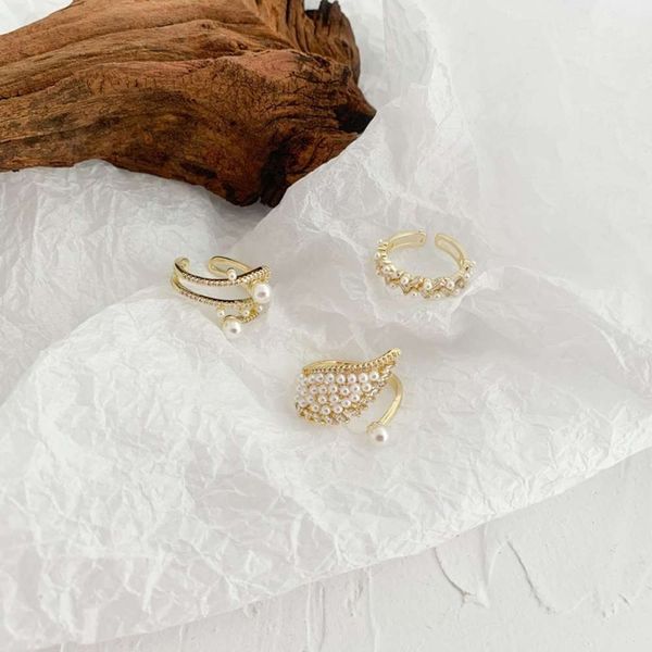 

special shaped pearl wings inlaid with diamond ring, Black