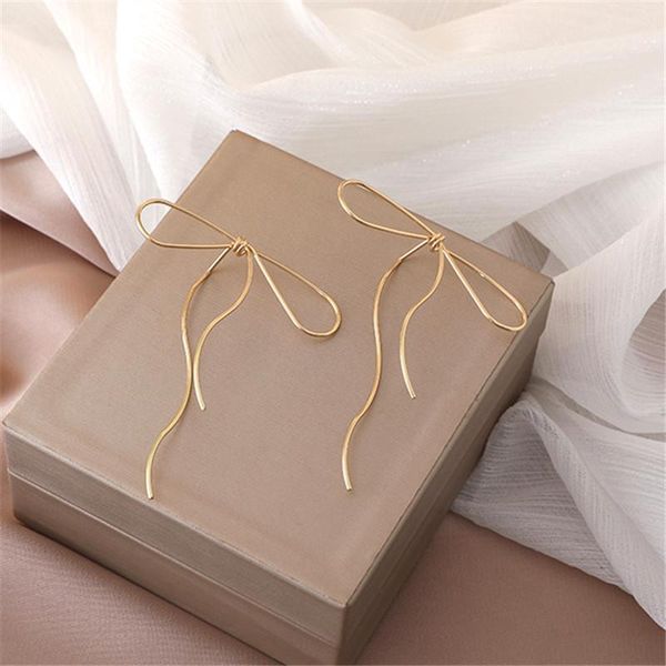 

stud dignified lady elegant metal bowknot ear korea dongdaemun simple playful long copper wire knot earrings for women jewelry, Golden;silver