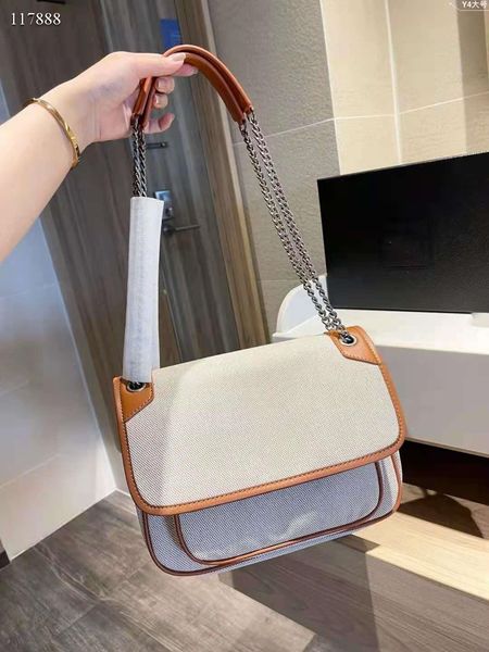

2021 designer women's single shoulder canvas postman bag size 28cm large 25cm small