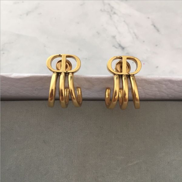 

70%off d family letter fashion simple versatile earrings for women, Golden