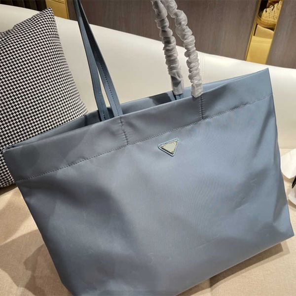 

2021 tote designer bag drawstring bags handbags leather high-capacity evening party shopping business occasions two colors with exquisite pa