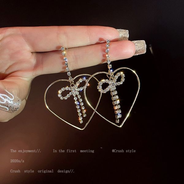 

925 silver needle inlaid diamond bow hollow love earrings fashion simple fashion design earrings net red earrings female