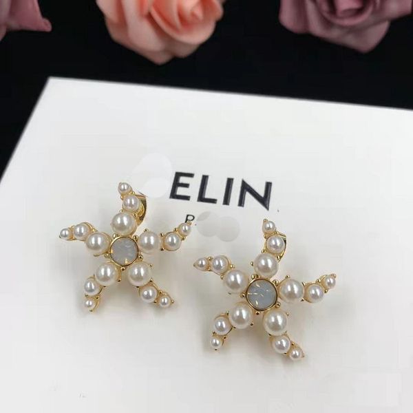 

design jewelry 2021 five pointed star pearl earrings brass shell earrings female 925 silver needle