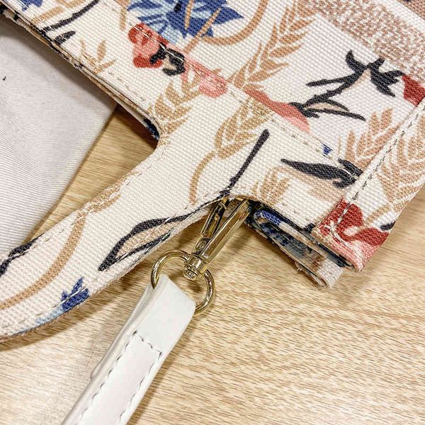 

this year's popular new summer portable small square bag letter flower printing fashion straddle canvas outlet purse