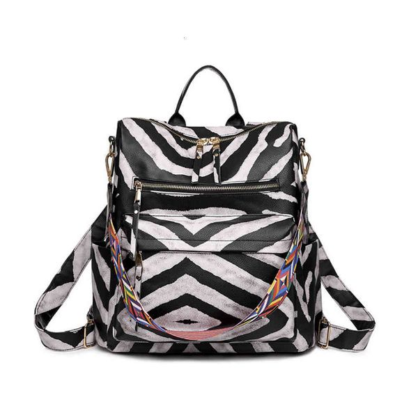 

2021 autumn national style spray painted backpack trend with color ribbon fashion large capacity backpack