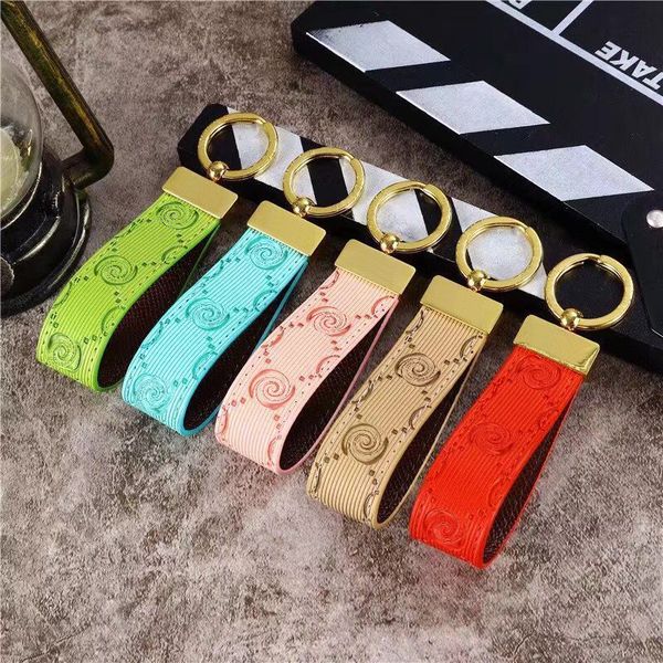 

mens fashion keychain designer handmade leather lovers key chains letter women car keychains womens luxury hanging rope acc, Silver