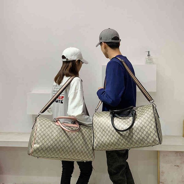 

new travel bag women's short distance large capacity luggage hand men's waterproof purse