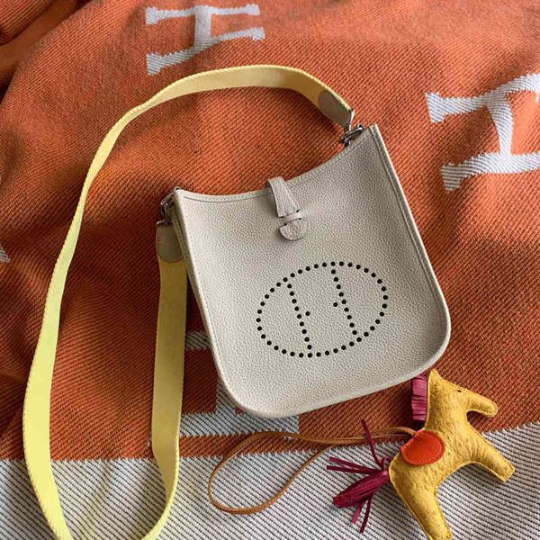 

womens fashion luxury classic premium brand designer shoulder bags family women's bag evelyn mini perforated bucket messenger texture