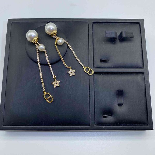 

2021 luxury designer jewelry 2021cd pearl tassel star earrings female popular net red simple small fragrance, Silver