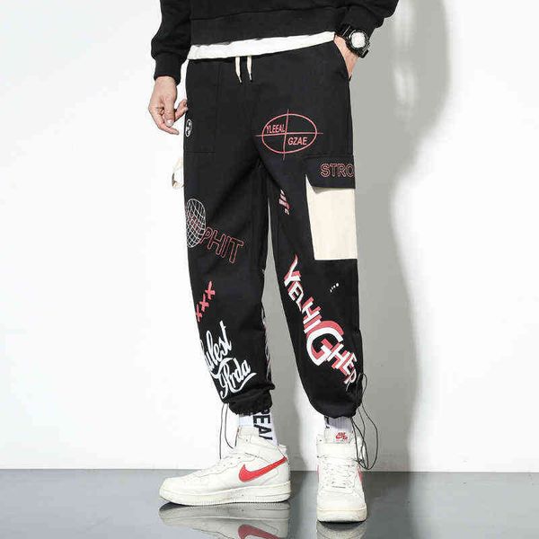 Pantaloni sportivi con stampa lettera per uomo 2021 Pantaloni sportivi moda Abbigliamento Teen Harajuku Graffiti Tasca laterale Pantaloni leggings Hip Hop Streetwear G0104