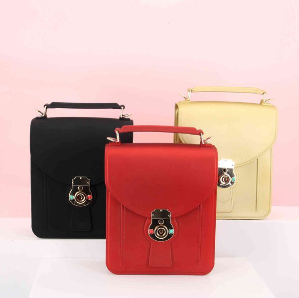 

winter style fashion women's bag solid color jelly pvc sewing