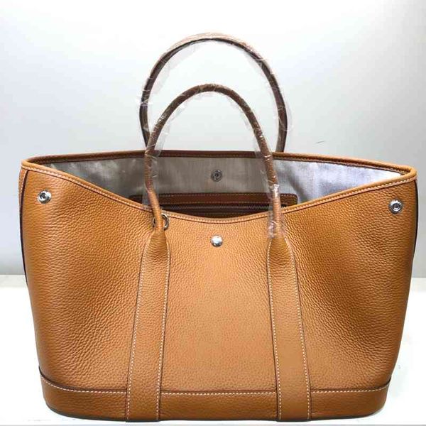 

designer bagsgenuine leather garden bag women's hand-held shopping bag deformed first layer cowhide fashion all-match soft leather larg