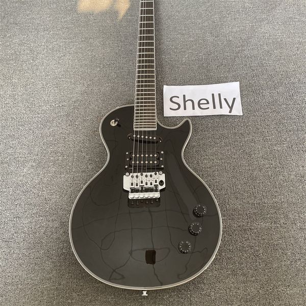 

electric guitar, rosewood fingerboard, black burst color quilte maple, initiative adapterization electric guitar