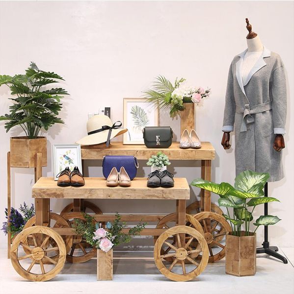 

flower shop rack clothing store display racks solid wood landing middle island high and low water platform combined with retro package stand